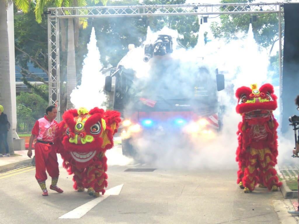 Lion dance and smoke welcome performance