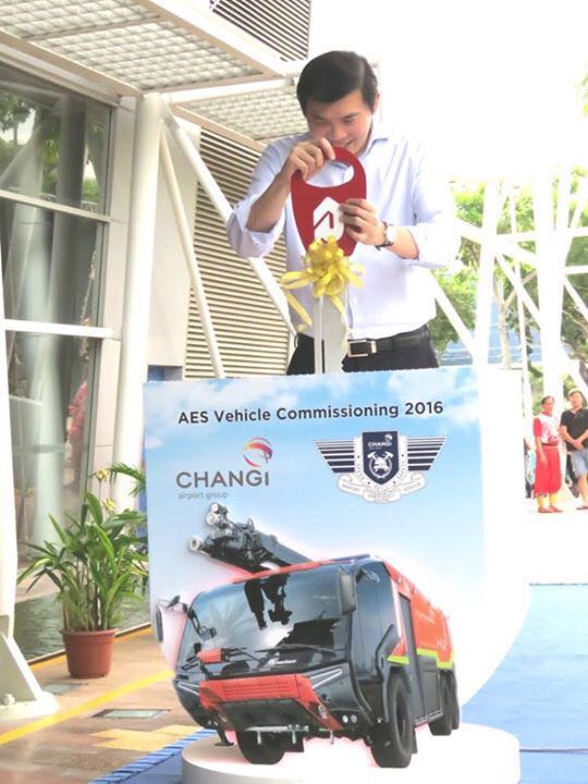 Ribbon cutting at vehicle commissioning ceremony