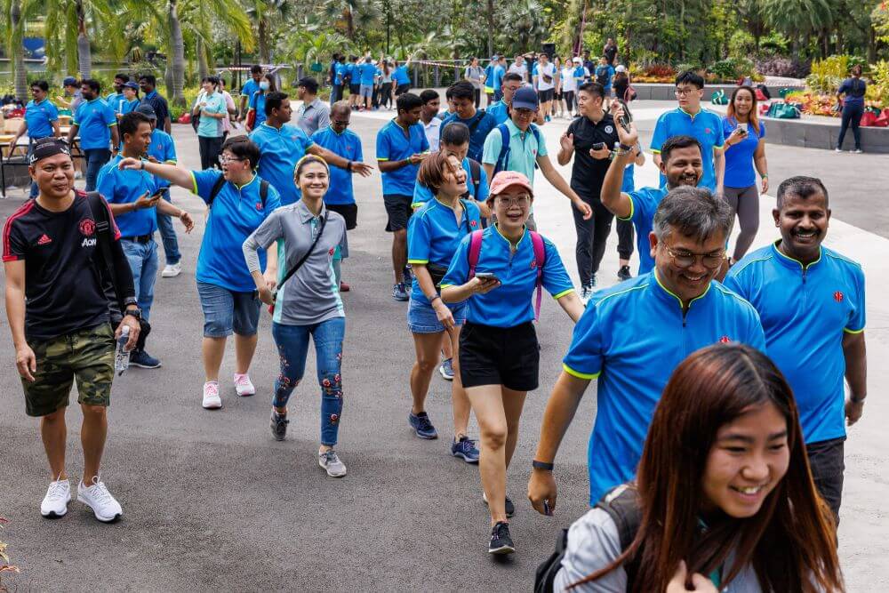 Team building walk with cheerful participants