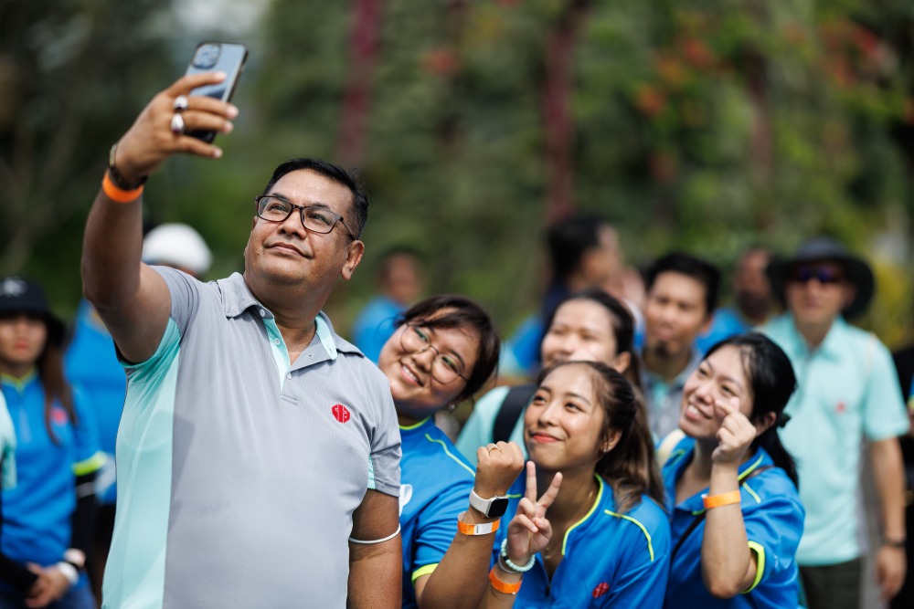 Team selfie during outdoor bonding activity
